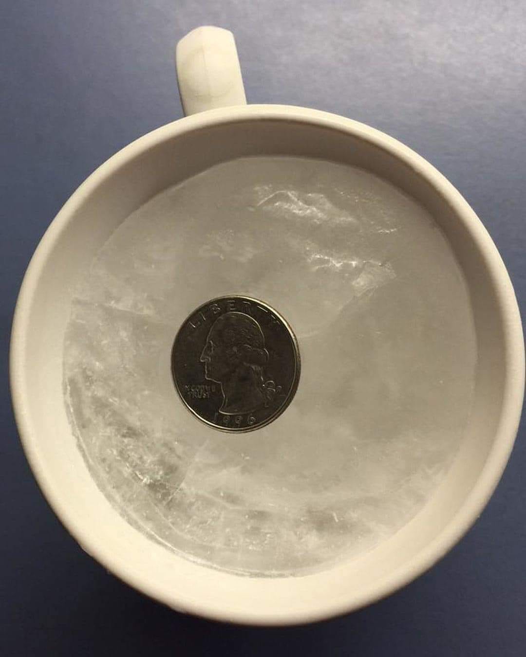 Why You Should Always Place a Coin on a Frozen Cup of Water Before Storms